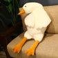 Offrez-vous un moment de douceur avec cette peluche coussin géante en forme d’oie